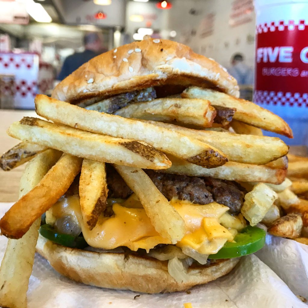 appealing-to-millenial-diners-five-guys-fry-stack-burger